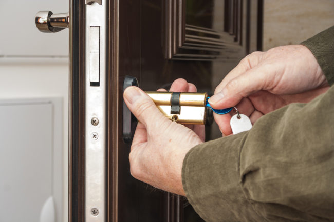 Locksmith replacing a cylinder lock Warning from your Friendly Watford Locksmith